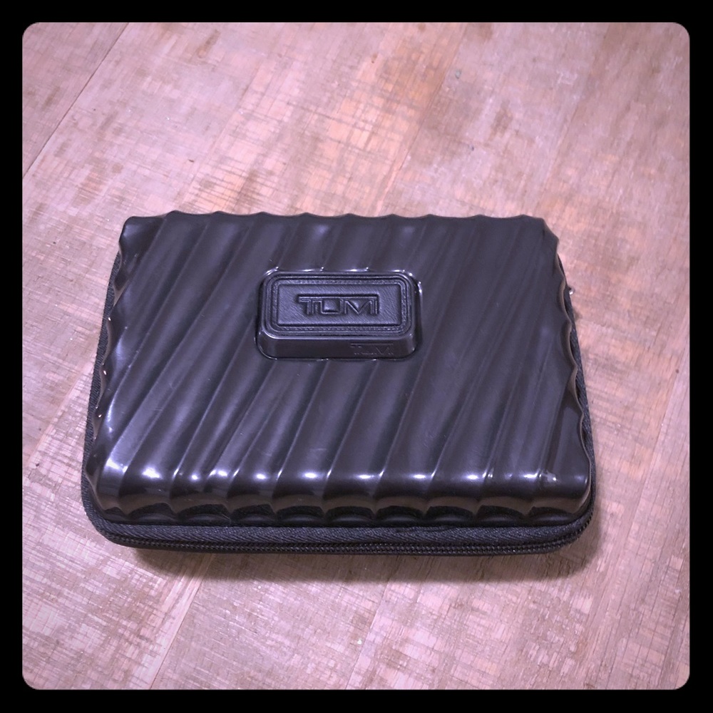 TUMI hard shell travel case